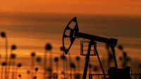 В Катаре спрогнозировали спад инвестиций в нефтегазовую отрасль
